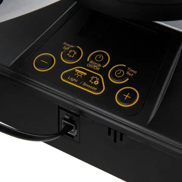 Control panel with yellow buttons on a black electronic device