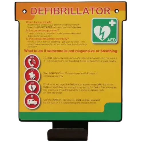 Defibrillator information sign with text and icons on a yellow background