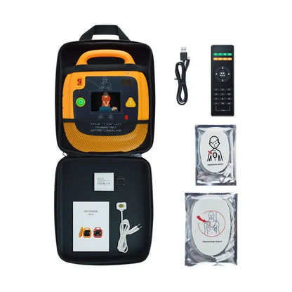 Defibrillator kit with open case displaying components on a white background
