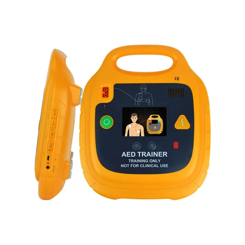 Yellow AED trainer device with a screen displaying training instructions on a white background