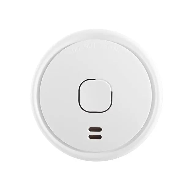 Round white device with a central switch on a white background