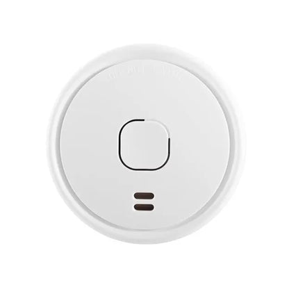 Round white device with a central switch on a white background