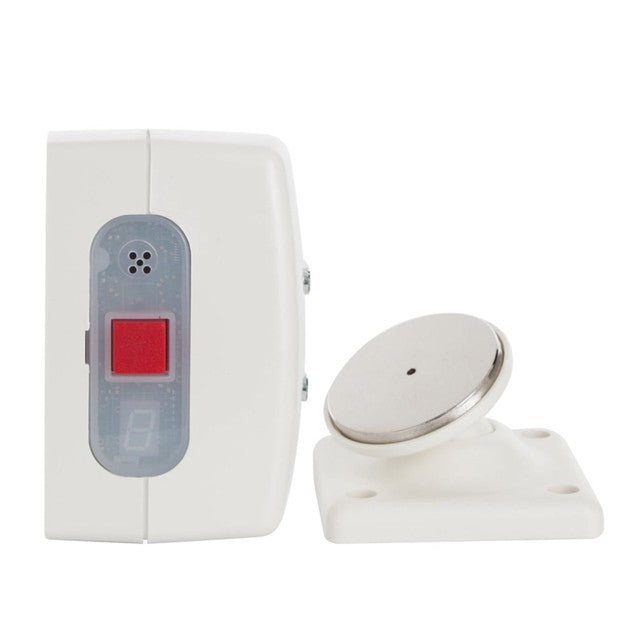 White electronic device with a red button and a separate sensor on a white background