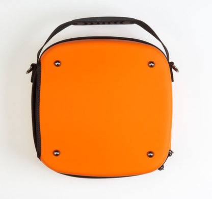 back or orange case with black handle on top
