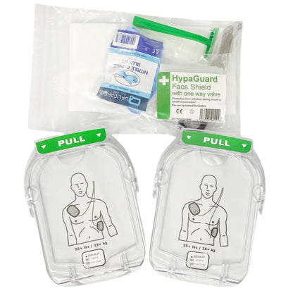 Two AED electrode pads with a HypaGuard face shield packaging on a white background